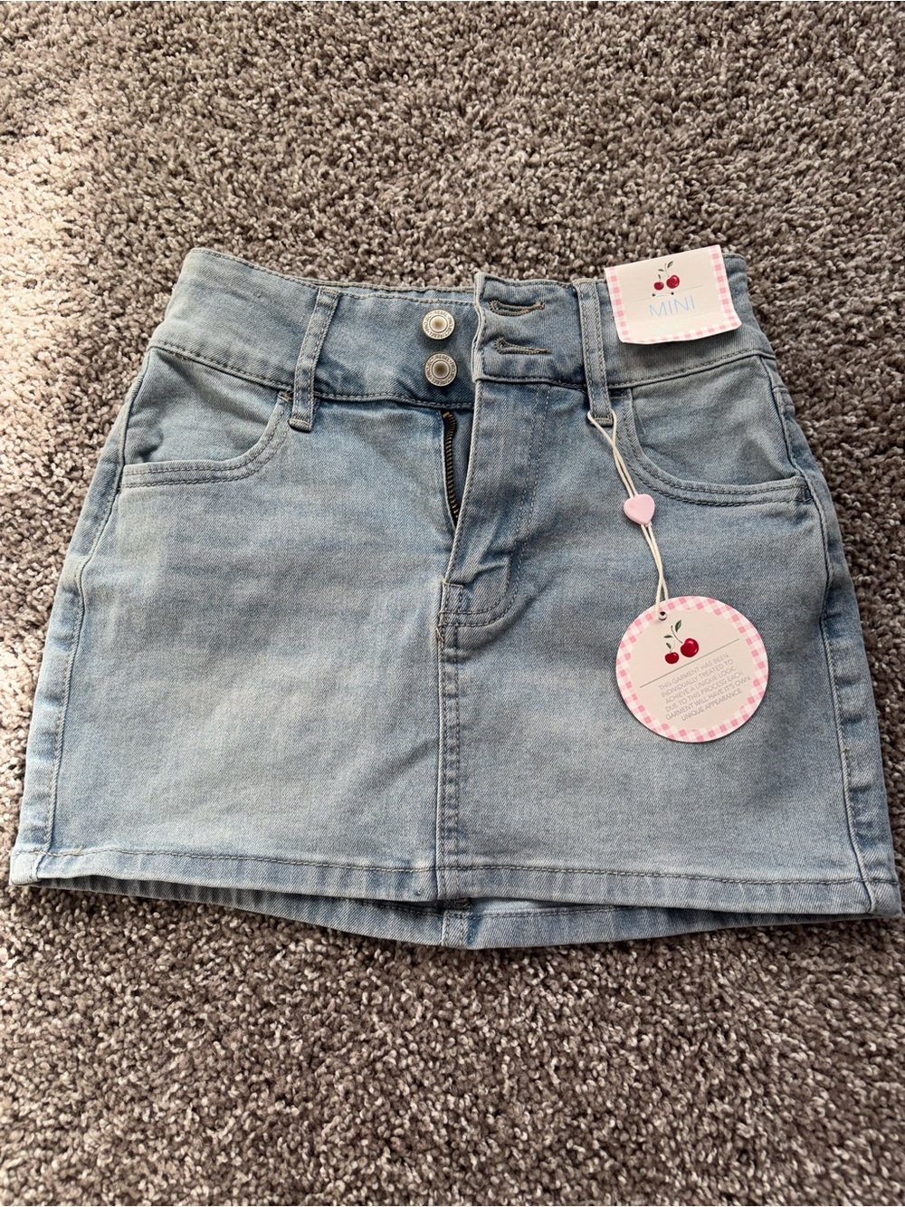 Mini Light Blue Denim Skirt with Double-Button Waist